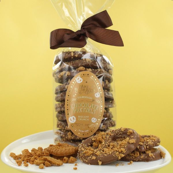 Milk chocolate pretzels topped with Biscoff crunch