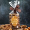 Giant sourdough pretzels coated in chocolate with salted caramel chips